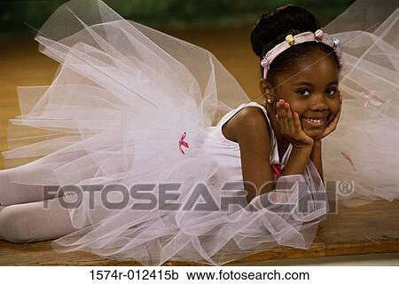 Stock Image - Portrait of a ballerina smiling. Fotosearch