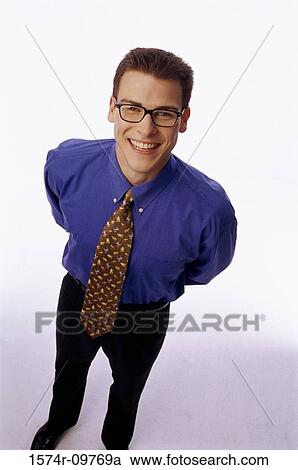 Portrait of a businessman smiling View Large Photo Image Stock Image - Portrait of a businessman smiling. Fotosearch