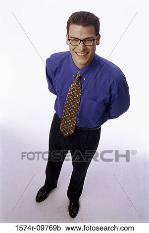 Stock Image - Portrait of a businessman smiling. Fotosearch