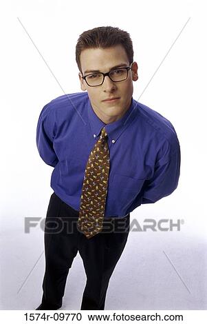 Portrait of a businessman smiling View Large Photo Image Stock Image - Portrait of a businessman smiling. Fotosearch