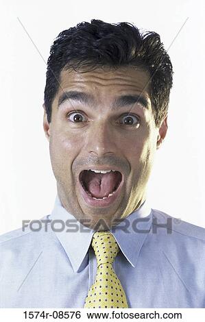 Portrait of a businessman with his mouth wide open View Large Photo Image Stock Photograph - Portrait of a businessman with his mouth wide open. Fotosearch