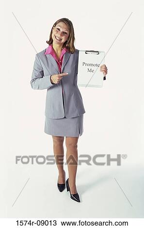 Portrait of a businesswoman holding a clipboard View Large Photo Image Stock Image - Portrait of a businesswoman holding a clipboard. Fotosearch