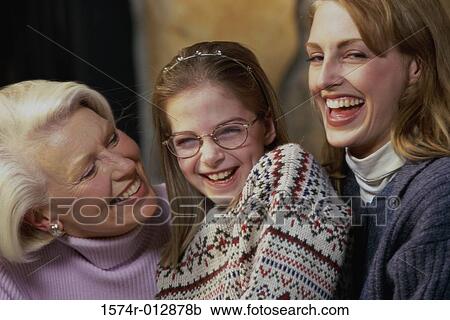 Portrait of a daughter smiling with her mother and grandmother View Large Photo Image Stock Image - Portrait of a daughter smiling with her mother and grandmother. Fotosearch