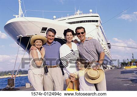 Stock Image - Portrait of a family smiling together. Fotosearch