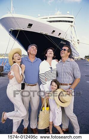 Portrait of a family smiling together View Large Photo Image Stock Image - Portrait of a family smiling together. Fotosearch