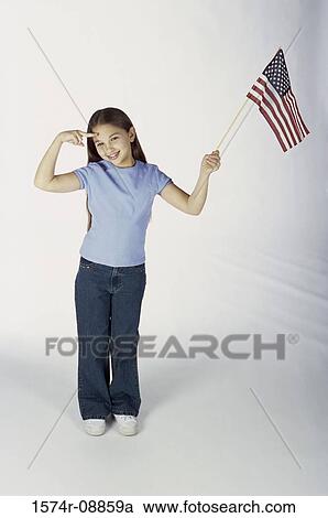 Portrait of a girl holding an American flag and saluting View Large Photo Image Stock Image - Portrait of a girl holding an American flag and saluting. Fotosearch