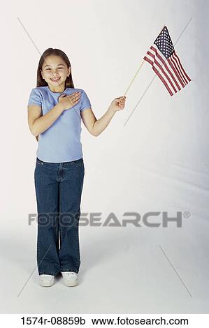 Portrait of a girl holding an American flag View Large Photo Image Stock Image - Portrait of a girl holding an American flag. Fotosearch