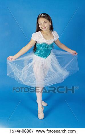 Portrait of a girl performing ballet View Large Photo Image Stock Photo - Portrait of a girl performing ballet. Fotosearch