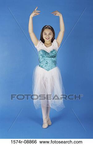 Portrait of a girl performing ballet View Large Photo Image Stock Photograph - Portrait of a girl performing ballet. Fotosearch