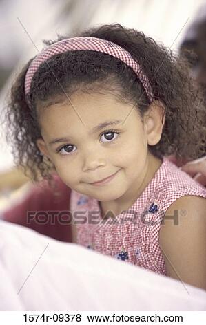 Portrait of a girl smiling View Large Photo Image Stock Photo - Portrait of a girl smiling. Fotosearch