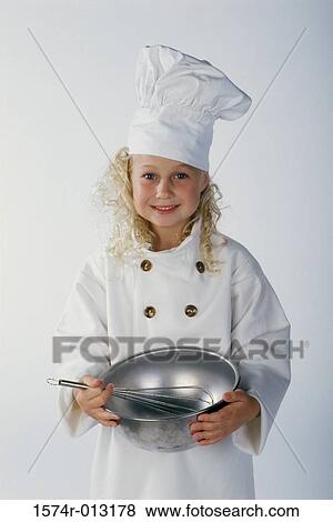 Portrait of a girl wearing a chef's uniform View Large Photo Image Stock Photo - Portrait of a girl wearing a chef's uniform. Fotosearch