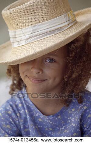 Portrait of a girl wearing a hat View Large Photo Image Stock Image - Portrait of a girl wearing a hat. Fotosearch