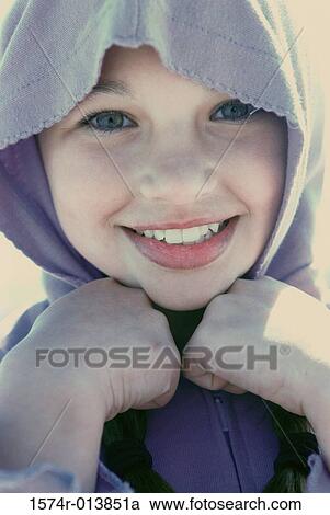 Portrait of a girl wearing a hooded shirt View Large Photo Image Stock Image - Portrait of a girl wearing a hooded shirt. Fotosearch