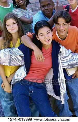 Portrait of a group of teenagers smiling View Large Photo Image Stock Photo - Portrait of a group of teenagers smiling. Fotosearch