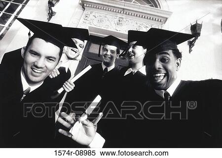 Portrait of a group of young graduates holding diplomas View Large Photo Image Stock Photography - Portrait of a group of young graduates holding diplomas. Fotosearch