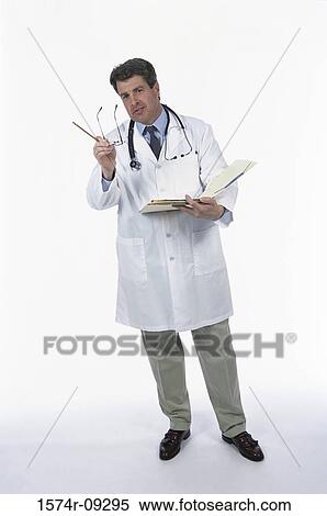 Portrait of a male doctor smiling holding a file View Large Photo Image Stock Photography - Portrait of a male doctor smiling holding a file. Fotosearch
