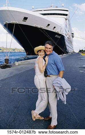 Portrait of a mature couple embracing each other View Large Photo Image Stock Image - Portrait of a mature couple embracing each other. Fotosearch
