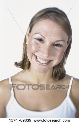 Portrait of a mid adult woman smiling View Large Photo Image Stock Photo - Portrait of a mid adult woman smiling. Fotosearch