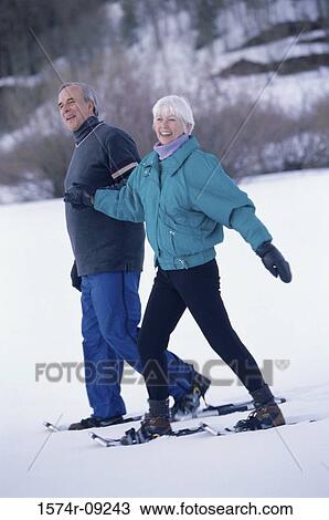 Portrait of a senior couple skiing View Large Photo Image Stock Image - Portrait of a senior couple skiing. Fotosearch