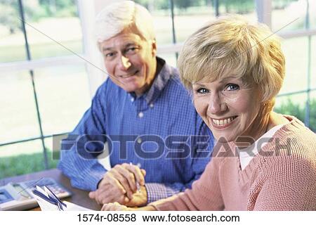 Portrait of a senior couple smiling View Large Photo Image Stock Photo - Portrait of a senior couple smiling. Fotosearch