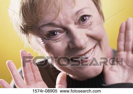 Portrait of a senior woman smiling View Large Photo Image Stock Photography - Portrait of a senior woman smiling. Fotosearch