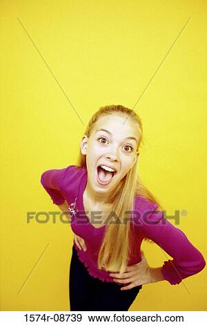 Portrait of a teenage girl smiling View Large Photo Image Stock Photo - Portrait of a teenage girl smiling. Fotosearch