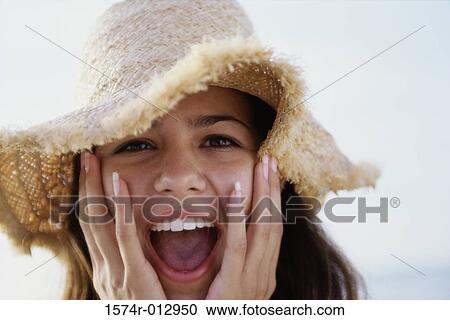 Portrait of a teenage girl wearing a hat View Large Photo Image Stock Image - Portrait of a teenage girl wearing a hat. Fotosearch