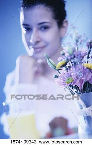 Portrait of a young woman smiling View Large Photo Image Stock Image - Portrait of a young woman smiling. Fotosearch