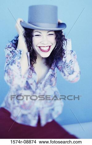 Picture - Portrait of a young woman wearing a hat. Fotosearch