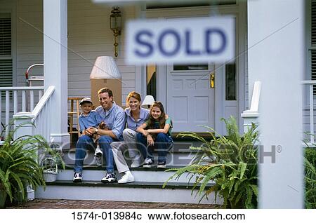 Portrait of parents sitting on the stairs of a house with their son and daughter View Large Photo Image Stock Image - Portrait of parents sitting on the stairs of a house with their son and daughter. Fotosearch