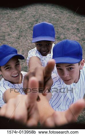 Stock Image - Portrait of three baseball players gesturing. Fotosearch