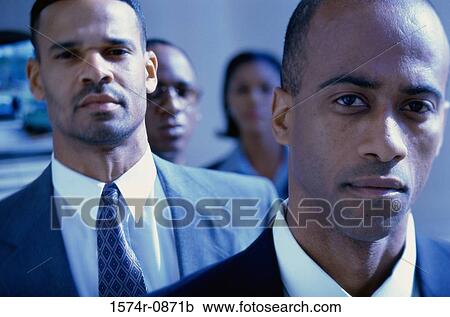 Portrait of three businessmen and a businesswoman View Large Photo Image Stock Image - Portrait of three businessmen and a businesswoman. Fotosearch