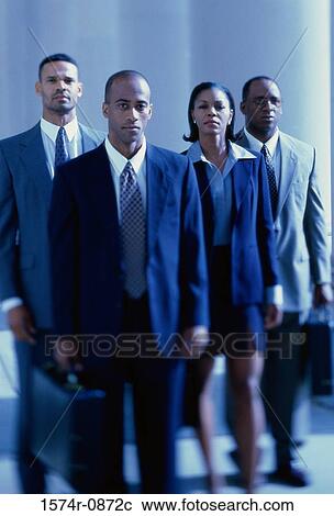 Portrait of three businessmen and a businesswoman View Large Photo Image Stock Image - Portrait of three businessmen and a businesswoman. Fotosearch