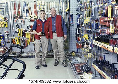 Portrait of two male clerks in a hardware store View Large Photo Image Stock Image - Portrait of two male clerks in a hardware store. Fotosearch