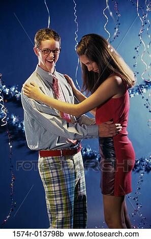 Side profile of a teenage couple dancing View Large Photo Image Stock Image - Side profile of a teenage couple dancing. Fotosearch