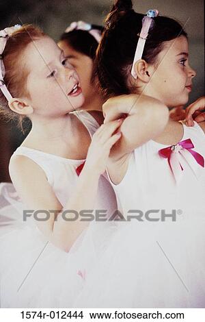 Side profile of two ballet dancers dancing View Large Photo Image Picture - Side profile of two ballet dancers dancing. Fotosearch