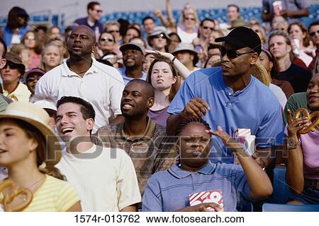Spectators in a stadium View Large Photo Image Stock Image - Spectators in a stadium. Fotosearch