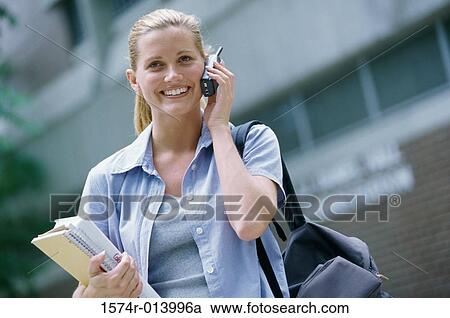 Teenage girl talking on a mobile phone View Large Photo Image Stock Image - Teenage girl talking on a mobile phone. Fotosearch