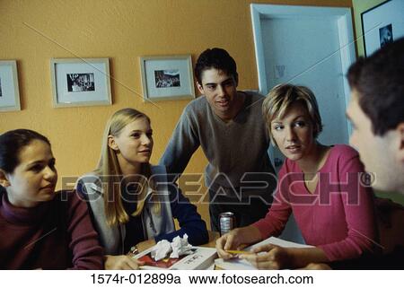 Three teenage girls and two teenage boys talking to each other View Large Photo Image Stock Image - Three teenage girls and two teenage boys talking to each other. Fotosearch