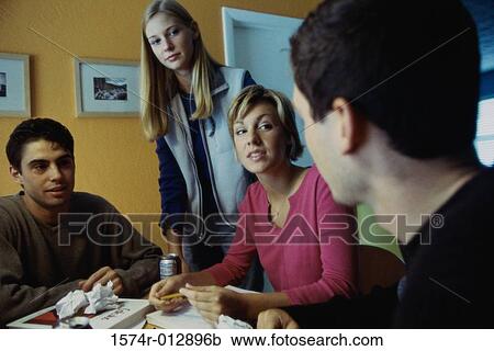 Two teenage boys and two teenage girls in a discussion View Large Photo Image Stock Image - Two teenage boys and two teenage girls in a discussion. Fotosearch