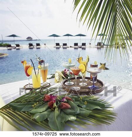 Stock Photography - Variety of cocktails on a table. Fotosearch