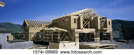Wooden framework of a house under construction View Large Photo Image Stock Photo - Wooden framework of a house under construction. Fotosearch
