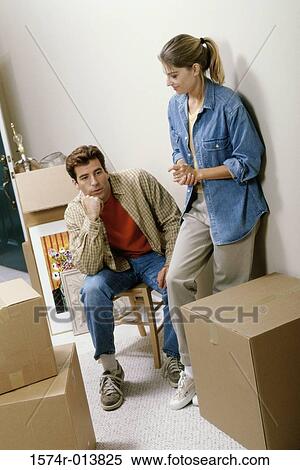 Young couple in a new house View Large Photo Image Stock Photography - Young couple in a new house. Fotosearch