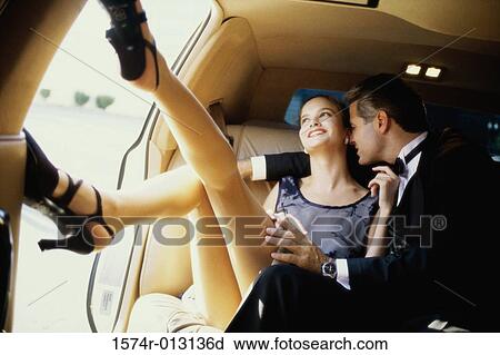 Young man flirting with a young woman in an airplane View Large Photo Image Stock Image - Young man flirting with a young woman in an airplane. Fotosearch