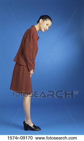 Young woman bending forward View Large Photo Image Stock Image - Young woman bending forward. Fotosearch