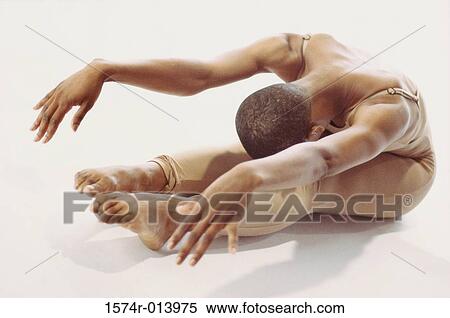 Young woman stretching View Large Photo Image Stock Photography - Young woman stretching. Fotosearch