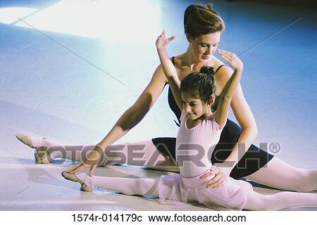 Ballet teacher training a girl View Large Photo Image Stock Image - Ballet teacher training a girl. Fotosearch