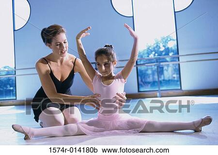 Ballet teacher training a girl View Large Photo Image Stock Image - Ballet teacher training a girl. Fotosearch