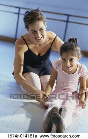 Ballet teacher training a girl View Large Photo Image Stock Image - Ballet teacher training a girl. Fotosearch