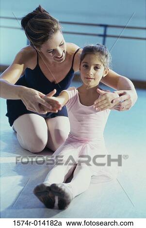 Ballet teacher training a girl View Large Photo Image Stock Image - Ballet teacher training a girl. Fotosearch